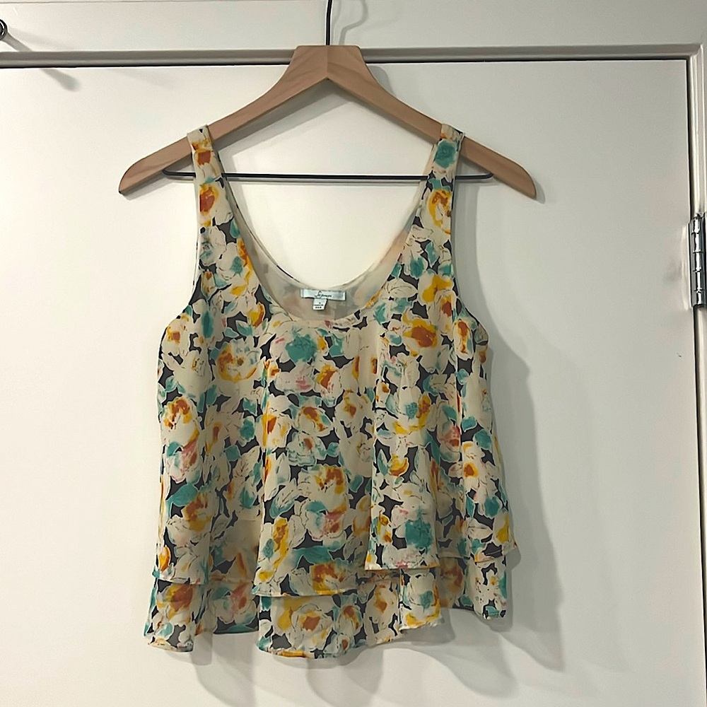 Floral, flowy tank. Easily worn without a bra, not transparent.
